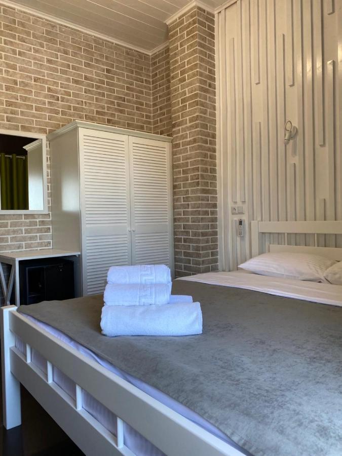 Captain Hotel Zatoka Bagian luar foto