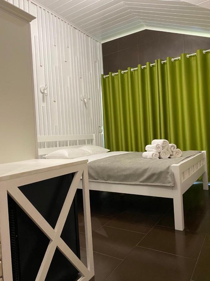 Captain Hotel Zatoka Bagian luar foto