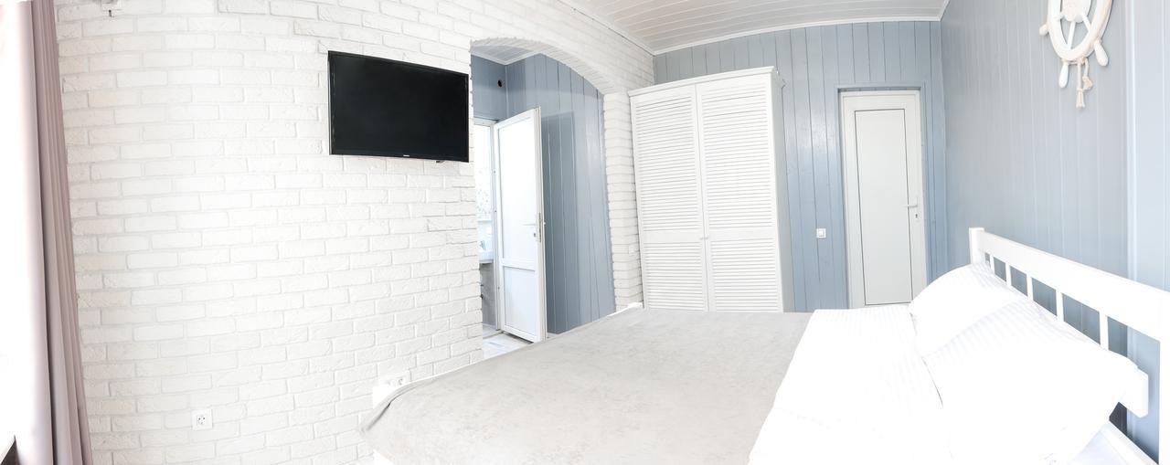 Captain Hotel Zatoka Bagian luar foto