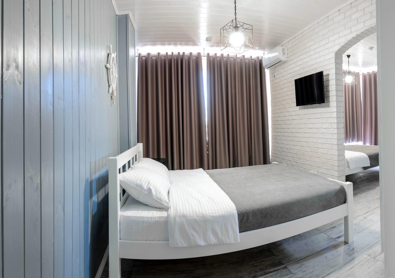 Captain Hotel Zatoka Bagian luar foto