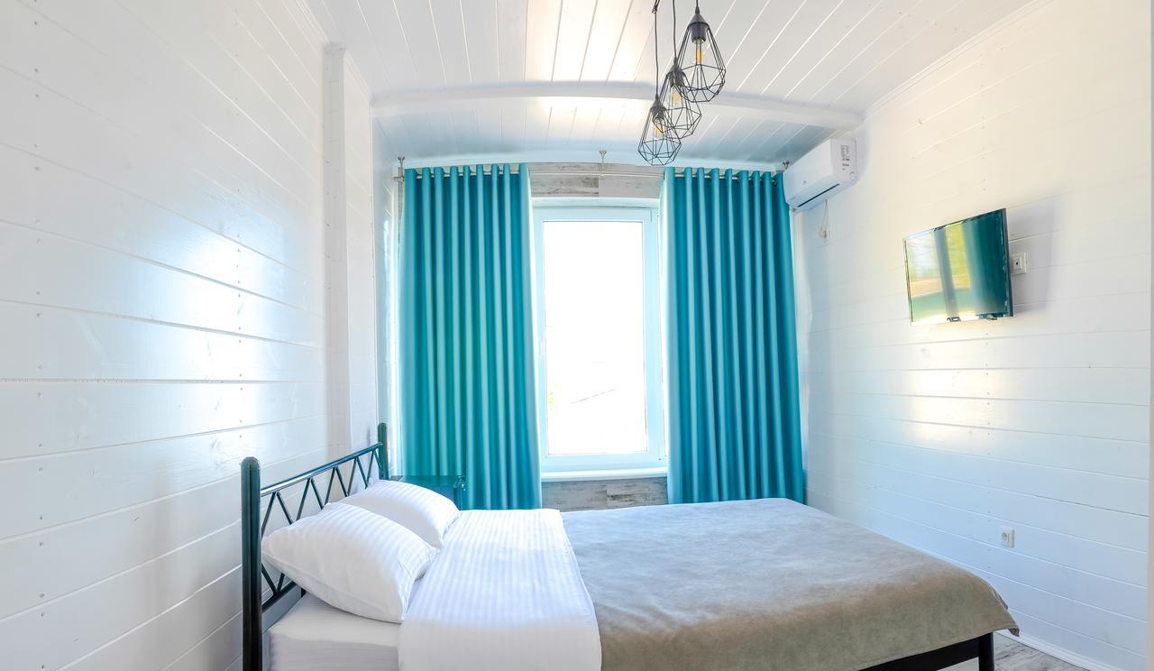 Captain Hotel Zatoka Bagian luar foto