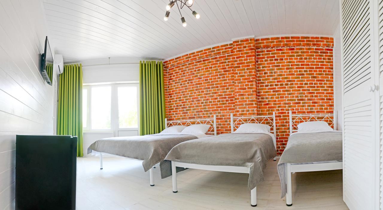 Captain Hotel Zatoka Bagian luar foto