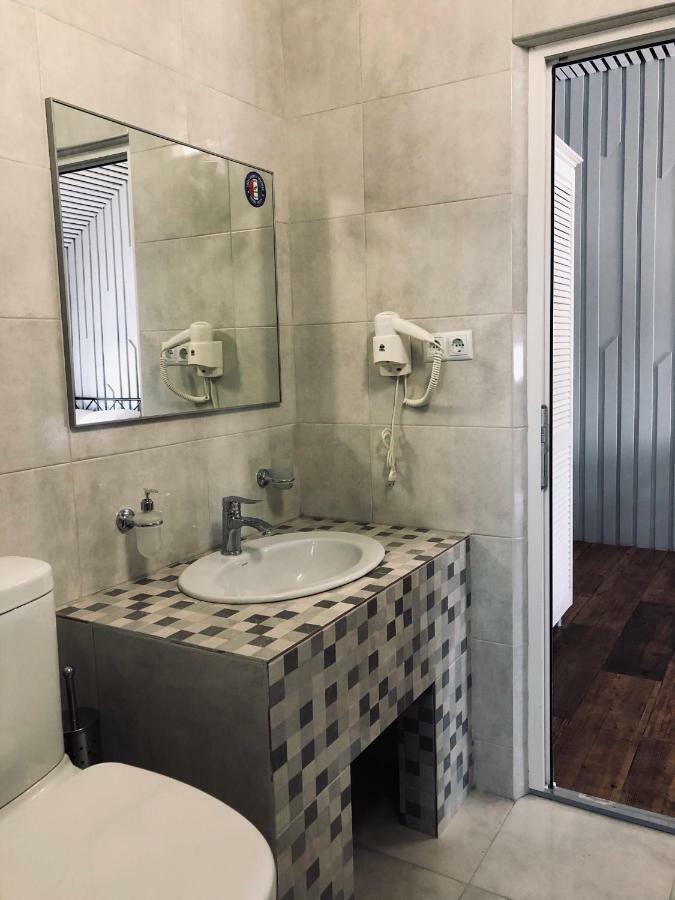Captain Hotel Zatoka Bagian luar foto